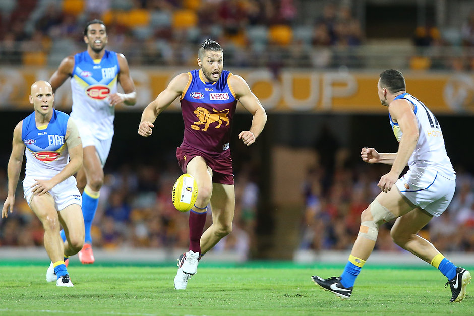 AFL 2016 Rd 04 - Brisbane v Gold Coast BRISBANE, AUSTRALIA - APRIL 16: Stefan Martin of the Lions kicks during the round four AFL match between the Brisbane Lions and the Gold Coast Suns at The Gabba on April 16, 2016 in Brisbane, Australia. (Photo by Chris Hyde/AFL Media/Getty Images)